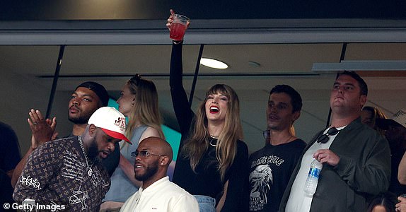 EAST RUTHERFORD, NEW JERSEY - OCTOBER 01: Singer Taylor Swift cheers prior to the game between the Kansas City Chiefs and the New York Jets at MetLife Stadium on October 01, 2023 in East Rutherford, New Jersey. (Photo by Elsa/Getty Images)