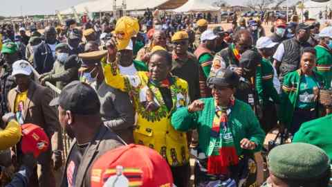 Emmerson Mnangagwa raises his cap to supporters in Bulawayo. The president will fall eventually, but only after further destruction of the state