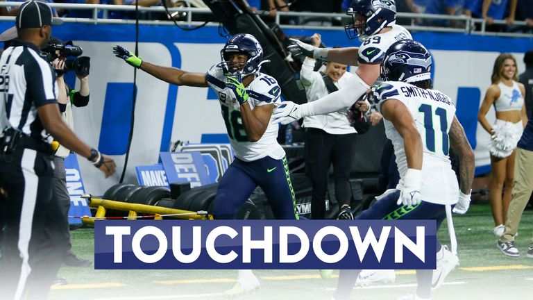 Seattle Seahawks wide receiver Tyler Lockett scores a game-winning TD in OT via a pylon reach on a 6-yard toss from quarterback Geno Smith to give the Seahawks the win over the Detroit Lions