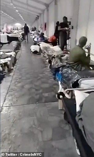 Footage shared online of the tent shelters shows rain leaking into the facility, coming in from the floorboards and the temporary roofs