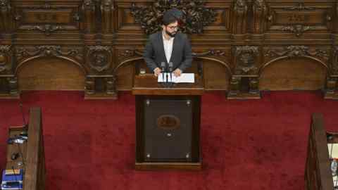 Gabriel Boric delivering a speech