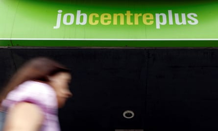 woman walking past a jobcentre