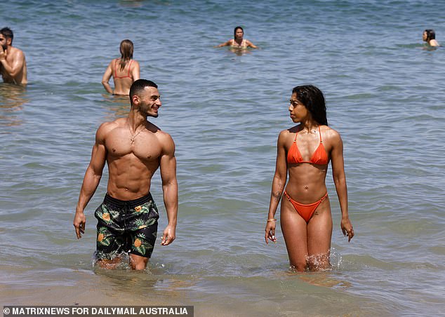 Sydney heat: Beachgoers enjoy a dip in the water as temperatures soar and NRL fans are warned ahead of Grand Final