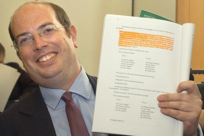 Andrew Gilligan holds up the Iraq dossier