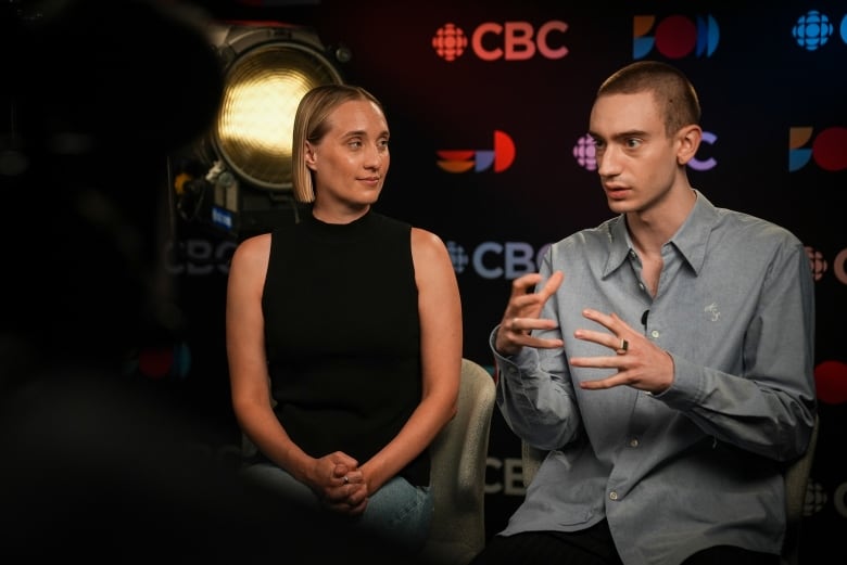 Solo's writer-director Sophie Dupuis sits next to Théodore Pellerin at the CBC in Toronto.