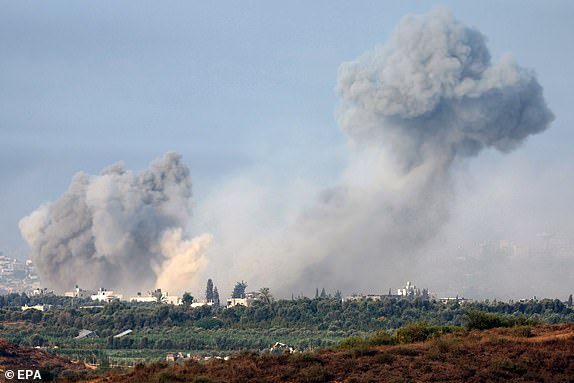 epa10952025 Smoke billows from the town of Beit Hanon in the northern part of the Gaza Strip as a result of an Israeli airstrike, as seen from southern Israel, 01 November 2023. Overnight, combined IDF troops struck several targets throughout the Gaza Strip as part of its 'ground operations' in the Gaza Strip, the Israel Defense Forces (IDF) said on 01 November, adding that since 07 October the IDF struck over 11,000 targets in the Palestinian enclave. More than 8,000 Palestinians and at least 1,400 Israelis have been killed, according to the IDF and the Palestinian health authority, since Hamas militants launched an attack against Israel from the Gaza Strip on 07 October, and the Israeli operations in Gaza and the West Bank which followed it. EPA/ATEF SAFADI