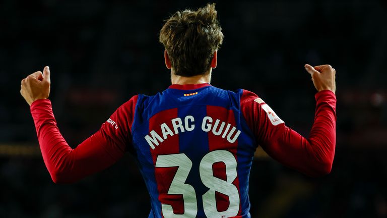 Barcelona's Marc Guiu celebrates after scoring his side's opening goal during a Spanish La Liga soccer match between Barcelona and Athletic Bilbao, at the Olympic Stadium of Montjuic in Barcelona, Spain, Sunday, Oct. 22, 2023. (AP Photo/Joan Monfort )