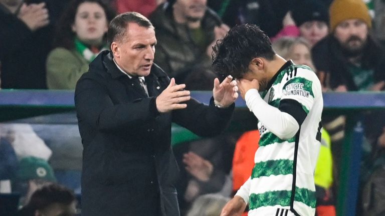 GLASGOW, SCOTLAND - OCTOBER 25: Celtic manager Brendan Rodgers comforts Reo Hatate after he is being forced off injured during a UEFA Champions League match between Celtic and Atletico de Madrid at Celtic Park, on October 25, 2023, in Glasgow, Scotland. (Photo by Rob Casey / SNS Group)