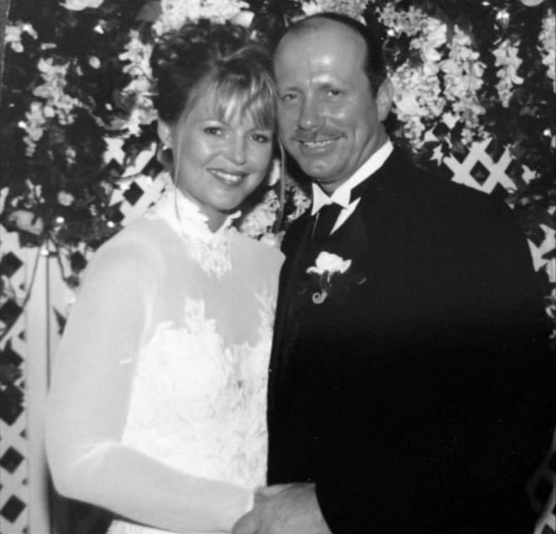 Black and white photo of a bride and groom