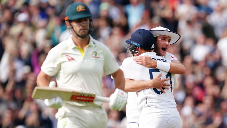 England&#39;s Stuart Broad and Jonny Bairstow celebrate the wicket of Australia&#39;s Mitchell Marsh during day five of the fifth Ashes Test at The Oval