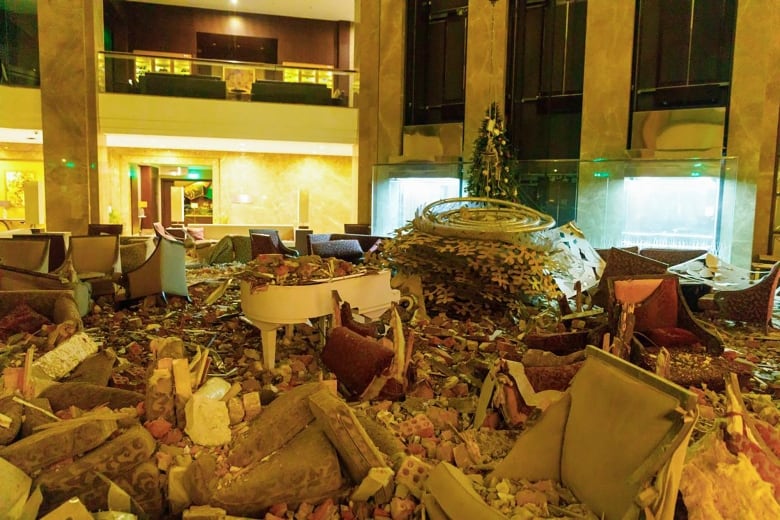 The ruined lobby of Kharkiv Palace Hotel in Ukraine after a Russian missile attack.