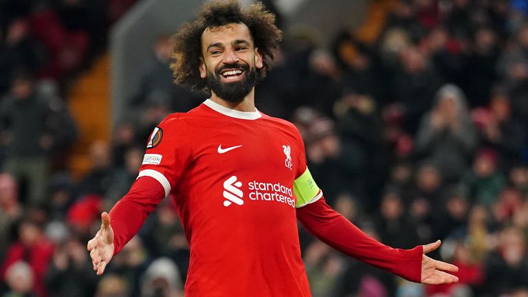 Liverpool&#39;s Mohamed Salah celebrates scoring their side&#39;s third goal of the game from the penalty spot