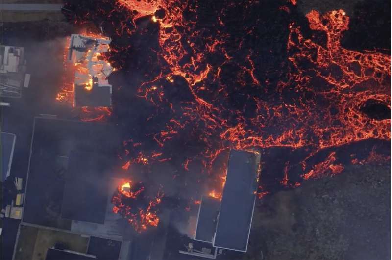 Iceland faces daunting period after lava from volcano destroys homes in fishing town, president says