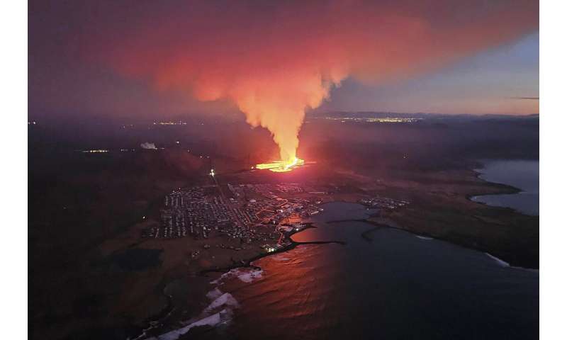 Iceland faces daunting period after lava from volcano destroys homes in fishing town, president says