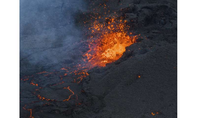 Iceland faces daunting period after lava from volcano destroys homes in fishing town, president says