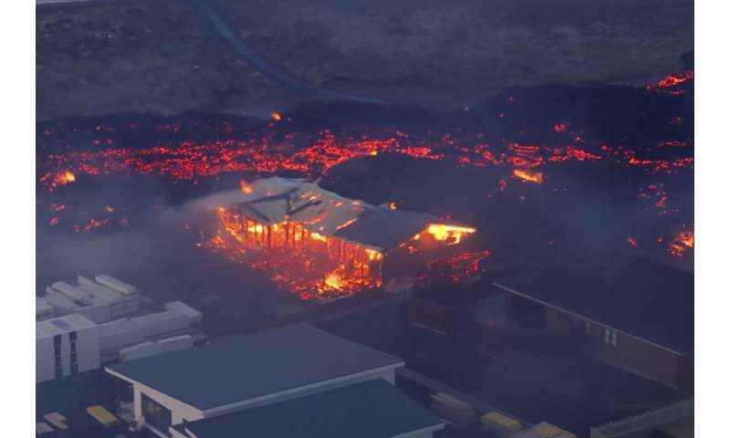 Iceland faces daunting period after lava from volcano destroys homes in fishing town, president says