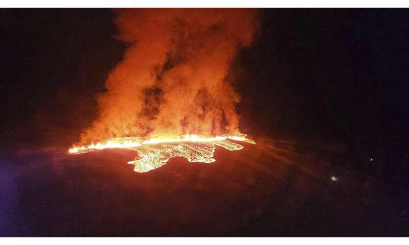 Iceland faces daunting period after lava from volcano destroys homes in fishing town, president says