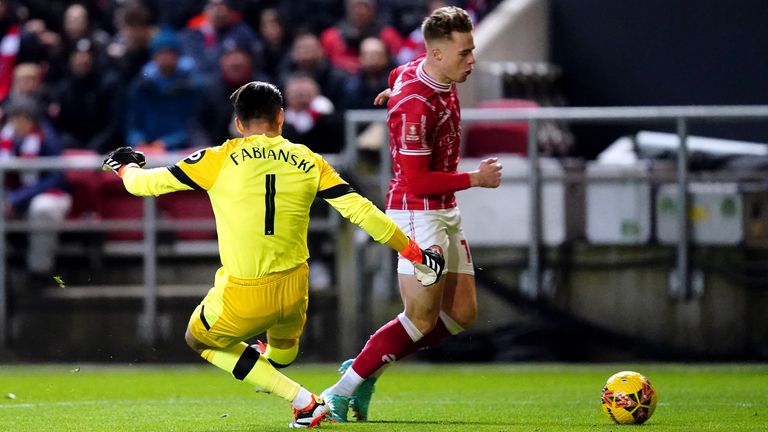 Bristol City's Tommy Conway rounds West Ham United goalkeeper Lukasz Fabianski before scoring