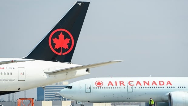 No charges laid after man in ‘state of crisis’ tries to open door mid-flight on Air Canada plane, police say