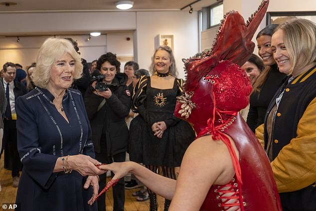 Camilla looked delighted to meet with the artist in the west London studio