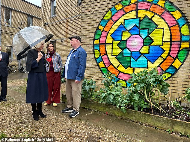 The Queen looked stylish in a navy blue frock while carrying a transparent brolley, clearly ready for London's wet weather