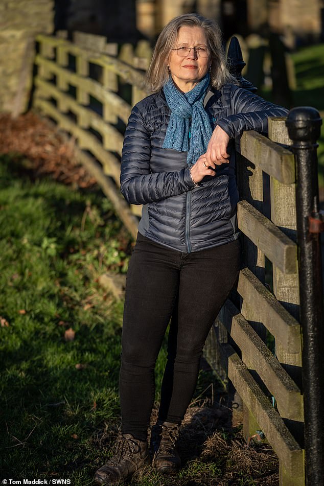 Janicke pictured leaning against a wooden fence following the terrifying ordeal which left her thinking she was going to die