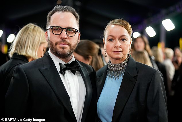 Samantha and her partner Harry Holm, the son of actor Lord of the Rings actor Sir Ian Holm at the Baftas last night. The couple have two chidren,