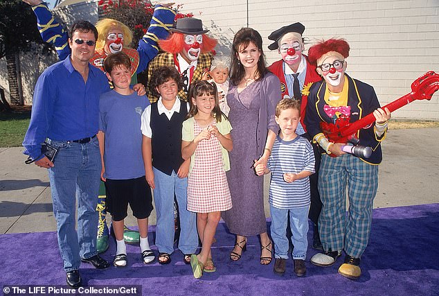 (L) Donny Osmond with his son (2L) and Marie (5L) with her children and circus performers at Barnum & Bailey benefit for the Make-A-Wish Foundation in the 1980s