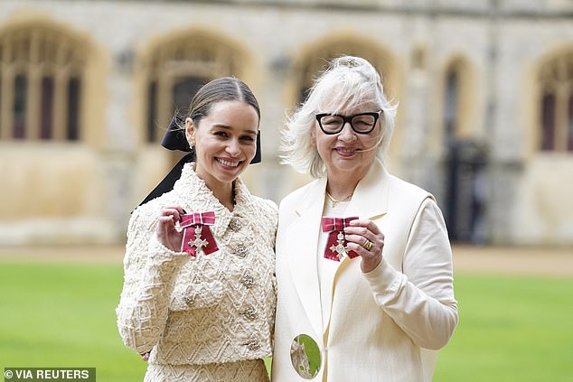 Emilia Clarke and her mother Jennifer Clarke pose after being awarded MBEs