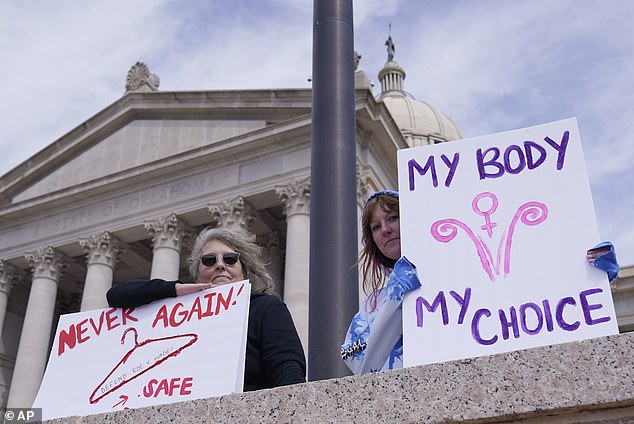 Shown above are campaigners outside the Oklahoma state legislature. They are urging state lawmakers not to ban abortions