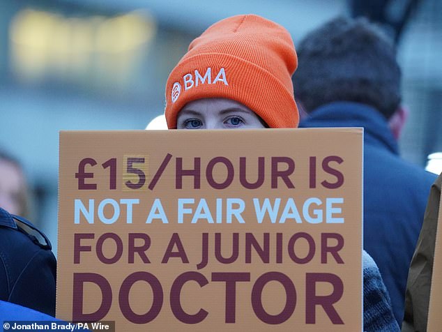 By the end of these latest strikes at 11.59pm on Wednesday, hospital doctors will have taken 44 days or 1,056 hours of industrial action, equating to around 12 per cent of the year (pictured: junior doctor outside St Thomas's Hospital)