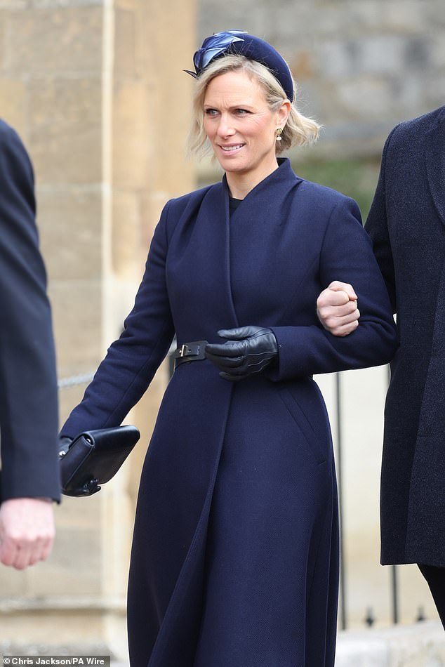 United front: Zara Tindall walks arm-in-arm with her husband Mike as they join Princess Anne at service for King Constantine of Greece in Windsor – while King Charles and Prince William are absent