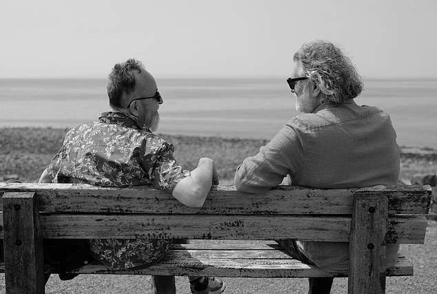 King also shared this black and white photo of him sitting with Dave on a bench