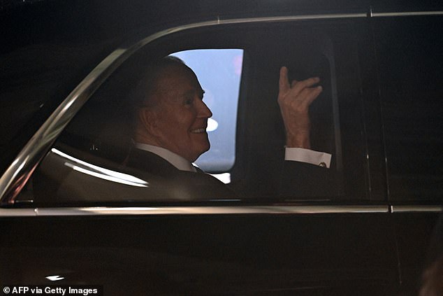 President Biden waves from The Beast