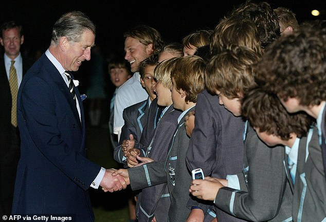 Prince Charles shakes hands with students from Geelong Grammar school in 2005. He spent time there in in 1966 as a 17-year old student