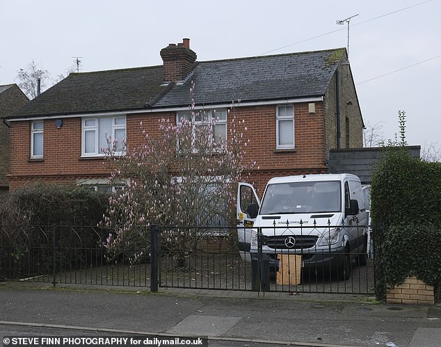 The home has now been boarded up with a security van sitting on the driveway