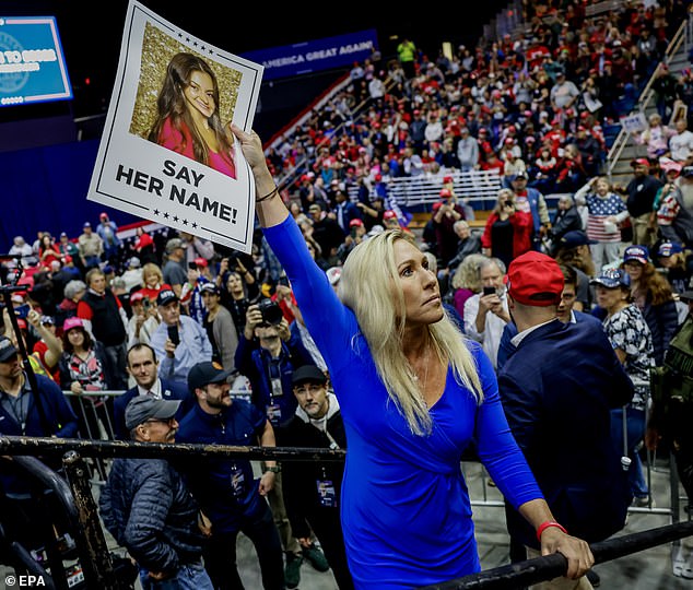 Greene still slammed Biden after he 'butchered' her name and said Lincoln instead of Laken. Pictured: MTG walks around the Forum River Center in Rome, Georgia ahead of Trump's remarks on Saturday, March 9 2024