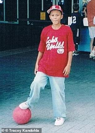 A young Dele Alli pictured with a football as a child...