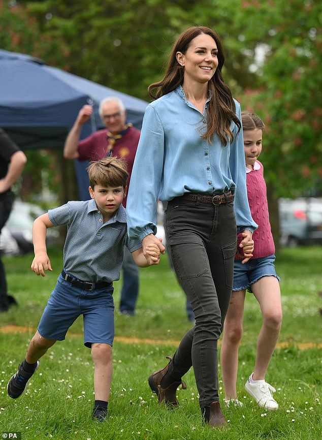 The couple are said to have visited the farm having watched their their three children - George, 10, Charlotte, eight, and Louis, five - take part in sports. Pictured: Kate with Louis and Charlotte in May 2023