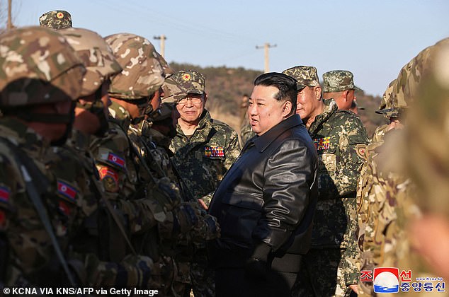 Kim Jong Un is pictured inspecting a major operational training base in the western area of the Korean People's Army earlier this month