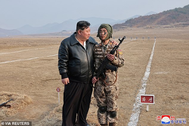 The North Korean despot was pictured standing next to a soldier during a training exercise this month