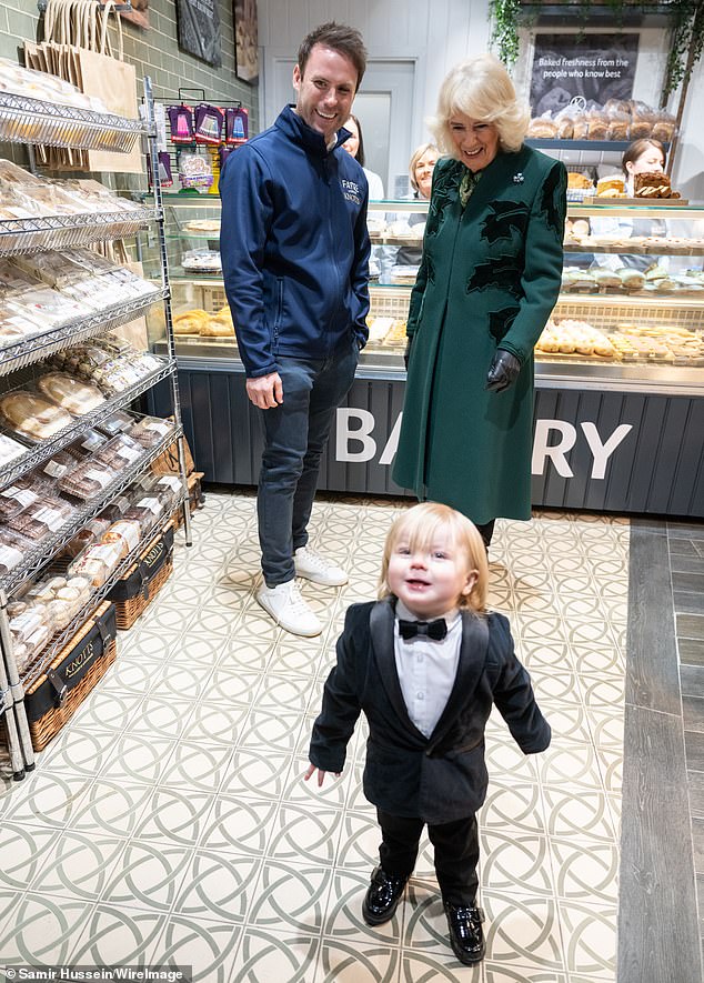 Queen Camilla found herself photobombed by one-year-old Fitz William Salmon-Corrie