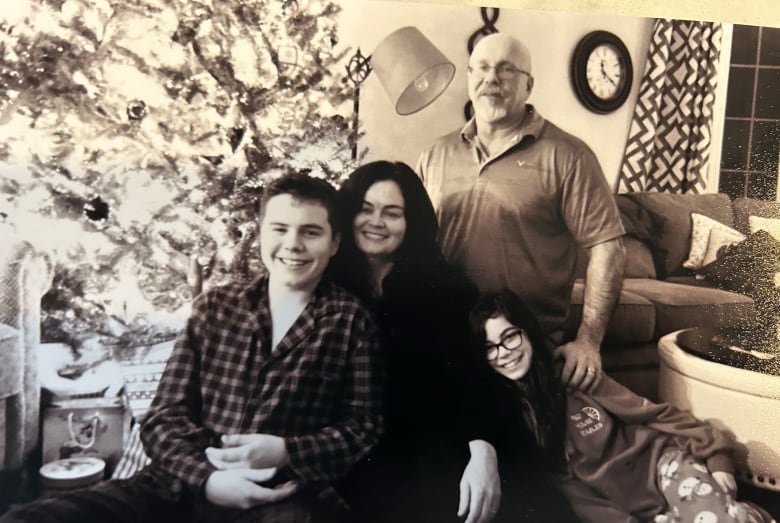 A black and white photo showing Harry Burke with his family when he was about 12 years old.