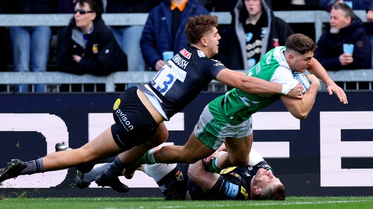 Benjamin Stevenson dives over to score Newcastle's first try at Sandy Park