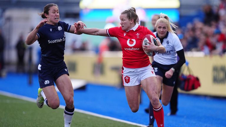 Wales' Carys Cox hands off Scotland's Rhona Lloyd