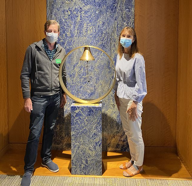 Mr Potts and his wife ringing the bell to mark his final chemotherapy session in March 2021