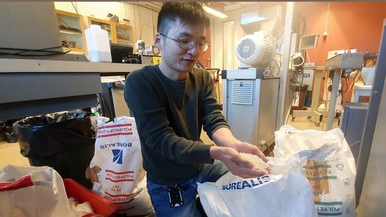 Xinfeng Wei Unpacking Plastic Pellets