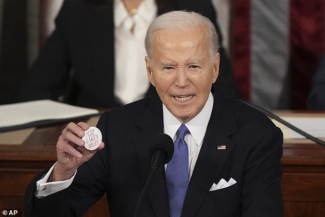 Biden calls murdered jogger ‘LINCOLN Riley’: President, 81, holds up pin given to him by Marjorie Taylor Greene but gets her name wrong as boasts about the ‘toughest border security reform in years’