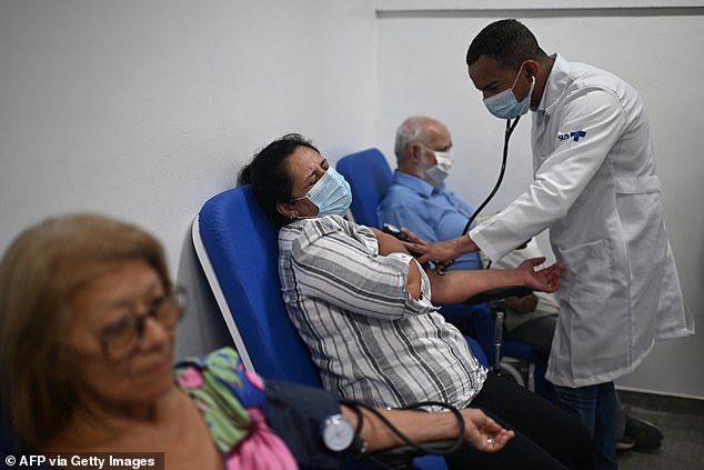 How Brazil’s ferocious dengue fever outbreak is a warning to the world: Patients motionless on waiting room floors, wailing in agony from ‘bone breaking disease’