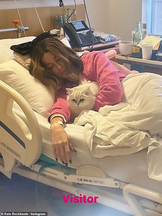 Kate Beckinsale gives update from her hospital bed after sparking concern with tearful selfies – two months after her stepfather Roy Battersby’s death